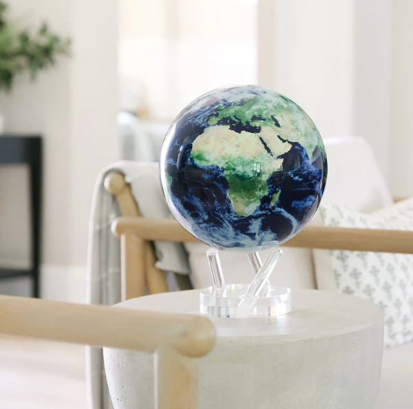 Gravity Globe displayed in a modern space